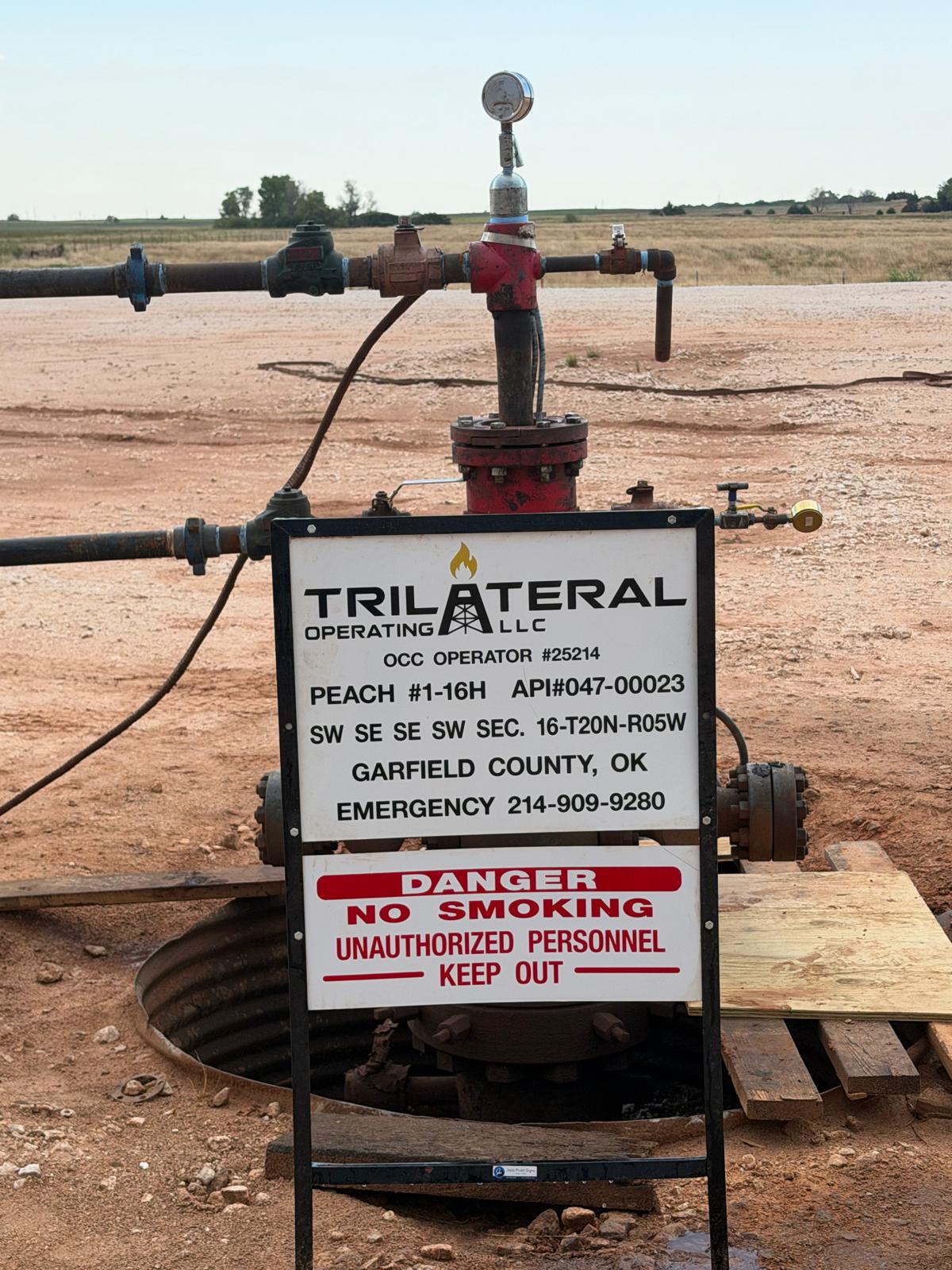 The Peach 1-16H wellhead and operating sign